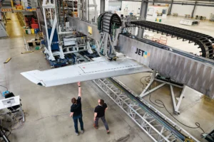 Overview of the 4JET laser system and aircraft wing