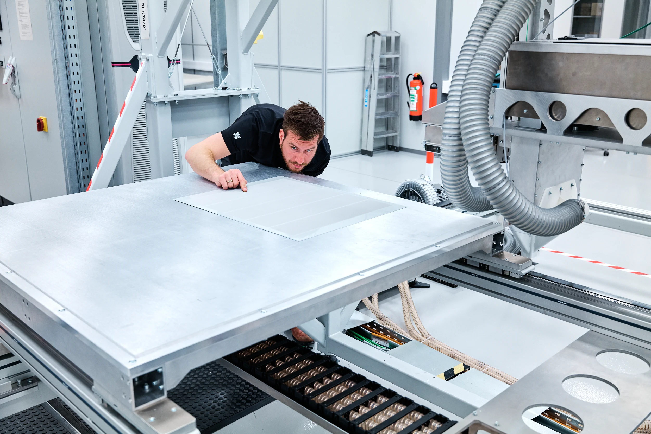 4JET engineer inspecting an aircraft panel