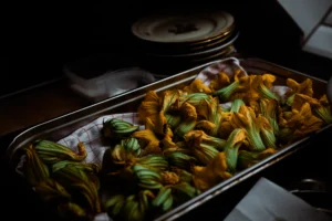 Seasonal vegetables roasting in the restaurant kitchen