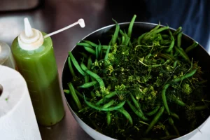 Freshly cooked greens prepared in the restaurant kitchen