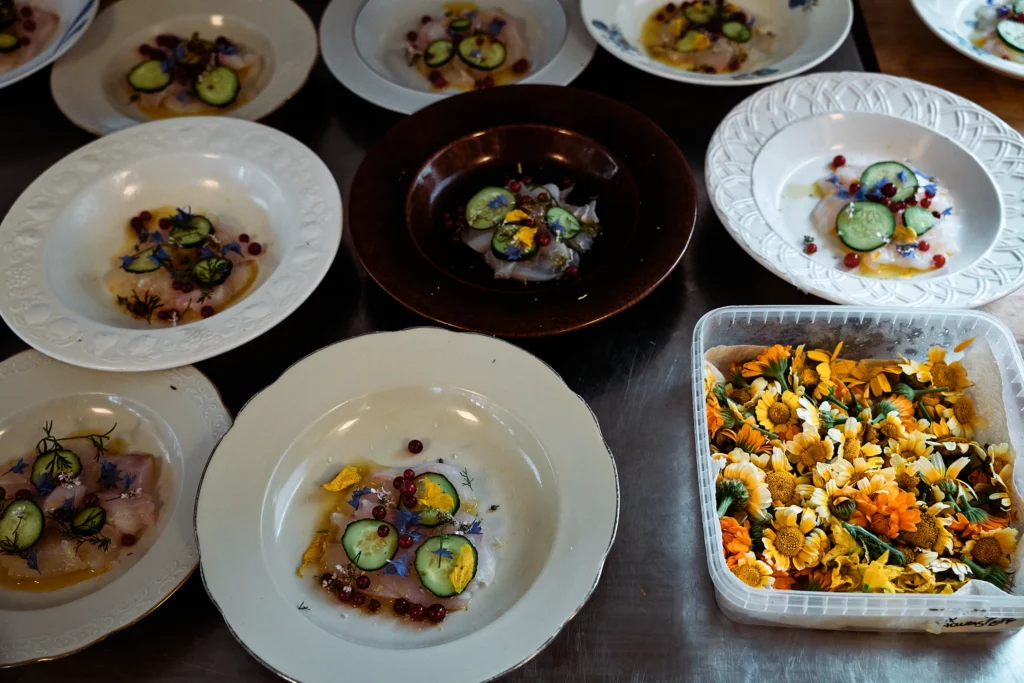 An overhead view of dishes prepared with farm ingredients