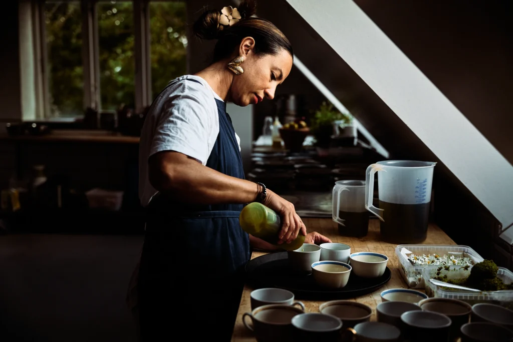 A chef cooking at the stove in the Birkemosegaard kitchen
