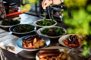 Farm-to-table dishes arranged outdoors at Birkemosegaard