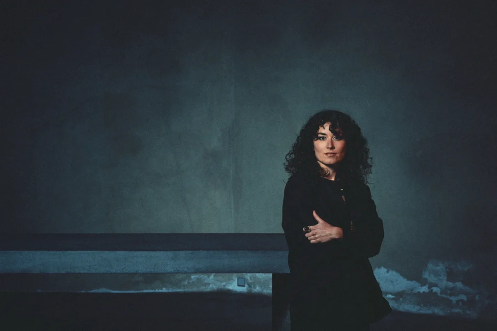 Wide editorial portrait of soprano Marie Heeschen of Ensemble BRuCH at St. Peter Cologne