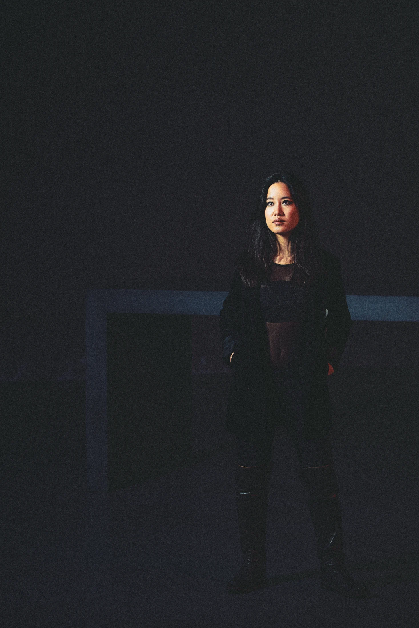 Pianist Claudia Chan of Ensemble BRuCH in a quiet fashion portrait at St. Peter Cologne