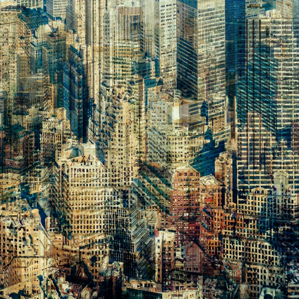 Abstract multilayer photograph of Manhattan architecture, combining overlapping urban structures, movement and light into a dense geometric composition.